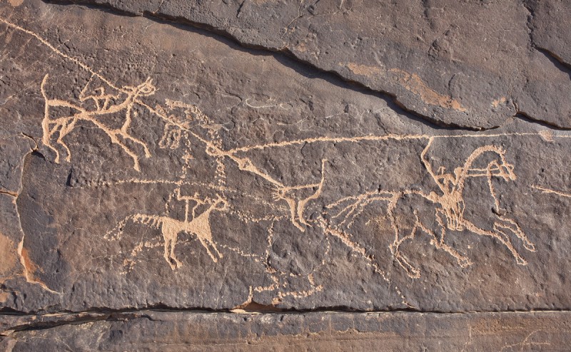 Rock engraving depicting an ostrich hunt: “Wadi Uqla horsemen and ostrich," Tayma oasis site in northwestern Saudi Arabia