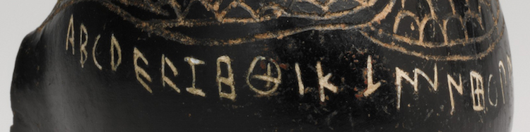 Alphabet (detail), Terracotta vase in the shape of a cockerel, c. 650-600 B.C.E., Etruscan, terracotta, bucchero, 4 1/16 in high (The Metropolitan Museum of Art)